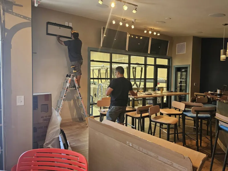 Interior fit-out at Panzu Brewery with the bar, lighting and windows being finished